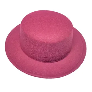 Top-down view of magenta wool felt flat brim hat showing matte texture and stitching