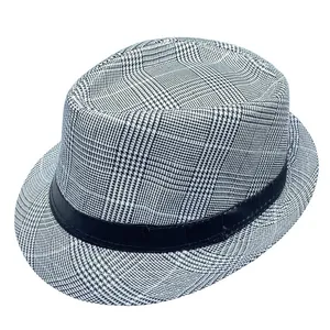 Close-up of black and white glen plaid fedora hat with a black decorative band