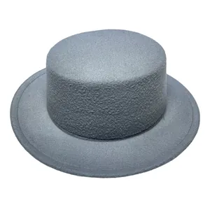 Macro detail of high-quality grey wool felt wide brim hat showing premium fabric texture