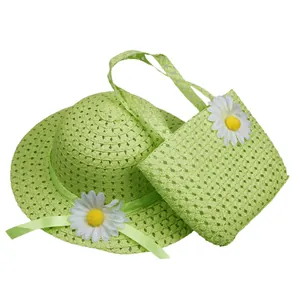 Straw sun hat and matching handbag set for kids with daisy flower accents in light green