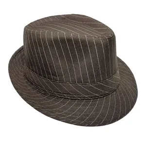 Detail of dark brown pinstripe fedora hat with classic crown and matching ribbon band
