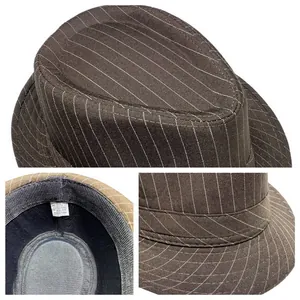 Detailed view of striped fedora lining showing size label and quality fabric texture