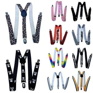 Detail of various elastic suspenders featuring rainbow, leopard and sequin patterns