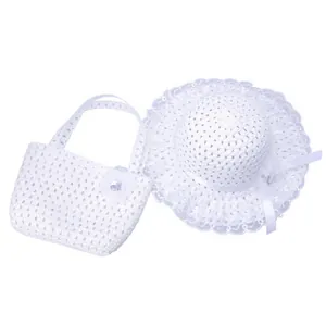 Detail view of children's white straw hat and handbag set with lace and floral accents