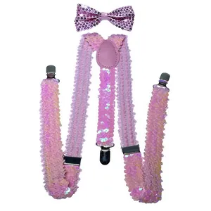 Pink sequined bow tie and suspender set with silver clips on a white background