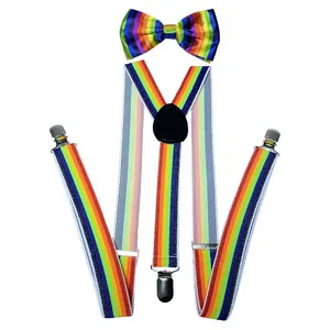 Detailed close-up of rainbow suspenders and bowtie set with silver metal clips