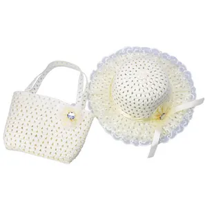 Detail of children's straw hat and bag set with lace trim and floral accents