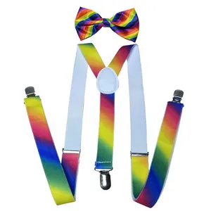 Close-up of rainbow striped Y-back suspenders and bow tie set with silver metal clips