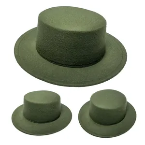 Detailed view of three olive green wide brim wool felt hats arranged on white background