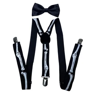 Detail of black suspenders and bow tie set featuring white skeleton bone prints