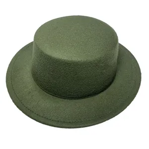 Detail view of dark green wool boater hat featuring a flat top and precision edge stitching