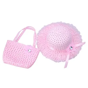 Pink straw hat and handbag set with delicate lace trim and ribbon bows for toddlers