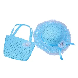 Detail of light blue straw hat and matching handbag with lace and floral accents