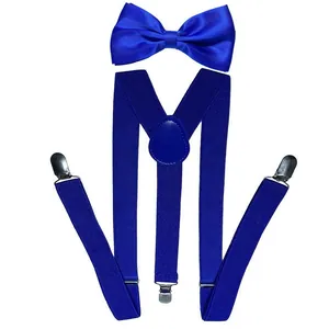 Detail of royal blue bow tie and elastic Y-back suspenders with silver metal clips