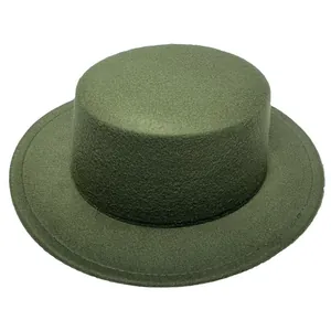 Close-up of the detailed stitching and felt texture on a flat-top dark green boater hat
