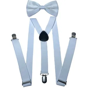 Detailed view of white Y-back elastic suspenders with silver metal clips and matching bowtie