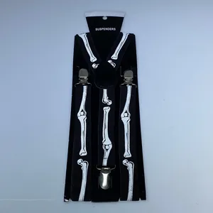 Detail view of rainbow skeleton suspenders with three metal clips on display card
