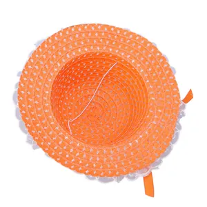 Internal view of orange straw sun hat with lace trim and elastic windproof rope detail
