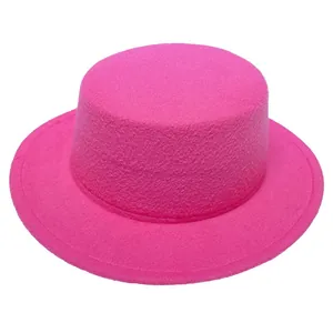 Close-up of bright rose pink wool felt flat top boater hat with a minimalist wide brim