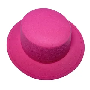 Close-up of fuchsia wool felt flat top hat with fine stitching and soft texture details