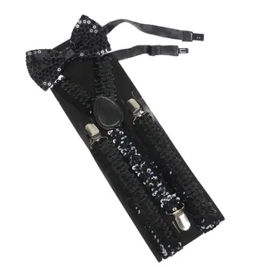 Close-up of black sequin bow tie and adjustable suspenders set on display card