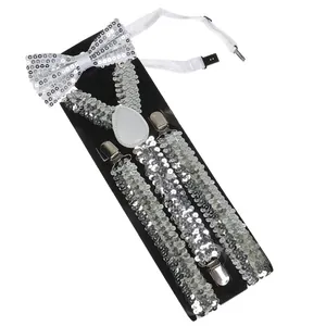 Detail view of silver sequin bow tie and Y-back suspenders set with metallic clips