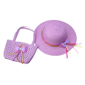 Close-up of kids purple straw hat and handbag set with ribbon and pearl bow accents