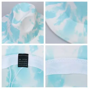 Detail view of tie-dye fedora showing stitching, sweatband and fabric labels