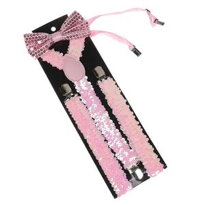 Pink sequined bow tie and suspender set for adults with metal clips on display card