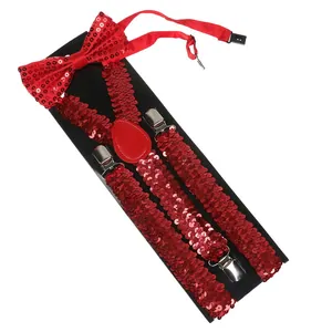 Detail of red sequined bow tie and Y-back suspenders with silver metal clips