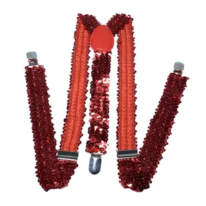 Detail of red sequin Y-back suspenders with metallic silver clips and leather joiner