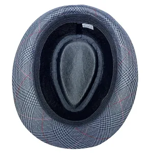 Internal view of grey plaid fedora showing size 58 label and sweatband detail
