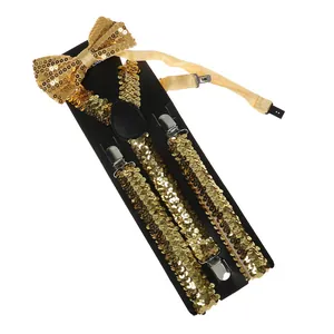 Detailed view of shiny gold sequin bowtie and Y-back suspenders with silver metal clips