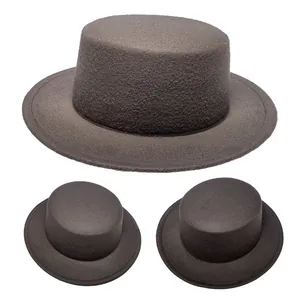 Detail of three dark brown wool felt boater hats showing soft matte texture and flat brim