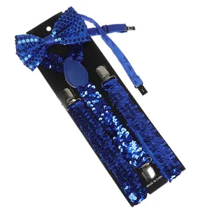 Close-up of royal blue sequin bowtie and suspenders set with metallic clips