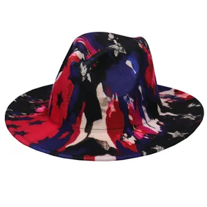 Macro shot of abstract tie-dye graffiti patterns on the wide brim of a wool fedora hat