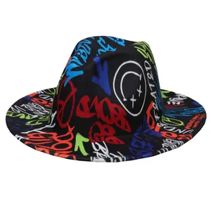 Close-up of colorful street graffiti patterns and artistic lettering on a black wool fedora