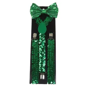 Detail of emerald green sequin bowtie and matching elastic suspenders for festive parties