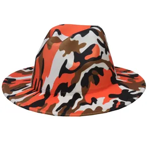 Detailed view of the orange camouflage fedora hat showing felt texture and flat brim