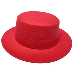 Detail view of red wide brim flat top wool fedora hat with premium felt texture