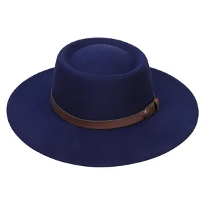Detail view of navy wool felt boater hat with decorative brown leather buckle band
