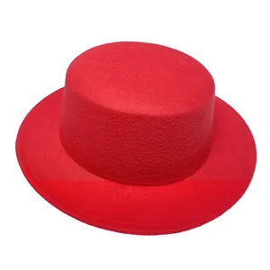 Detailed view of the red wool felt flat top fedora with a wide straight brim texture