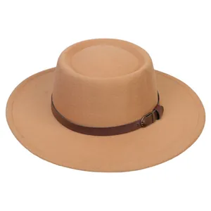 Detail showing camel wool felt pork pie hat with brown leather band and metal buckle