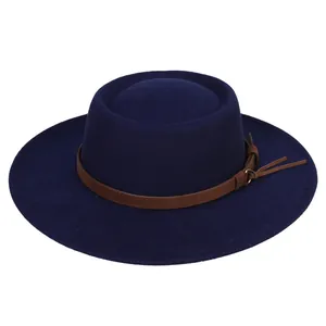 Detailed view of navy blue wool fedora featuring a brown leather band and metallic buckle