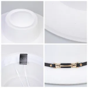 Detail view of white wool jazz hat with adjustable inner strap and cotton lining