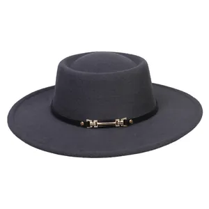 Detailed view of the dark grey felt flat top hat with black leather band and gold buckle