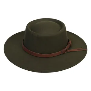 Detail of dark green wide brim fedora with brown leather strap and gold buckle