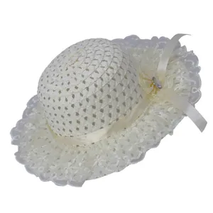 Detailed view of hollow knit summer sun hat with floral lace trim and satin bow