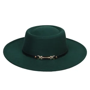 Close-up of dark green felt fedora hat featuring a black belt and gold metal buckle
