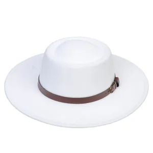 Detail of white wool boater hat with a brown leather strap and bronze metal buckle
